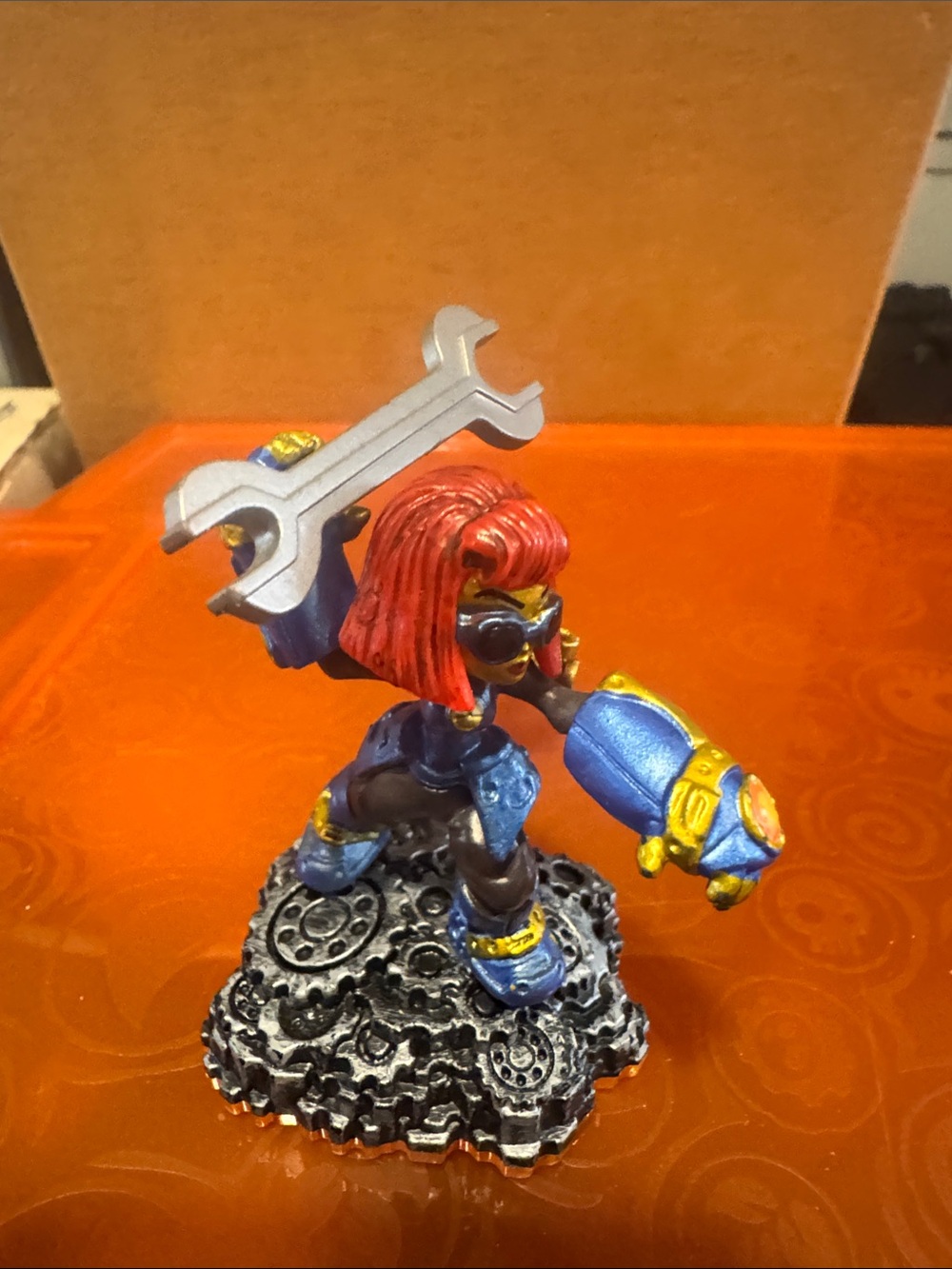 Red-haired Mechanic Figurine with Wrench and Blue Armor
